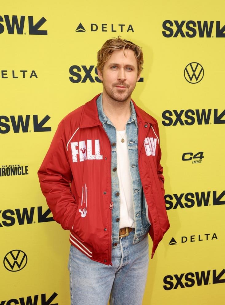 Gosling sported a crimson members-only jacket with the movie's title over the chest and trousers